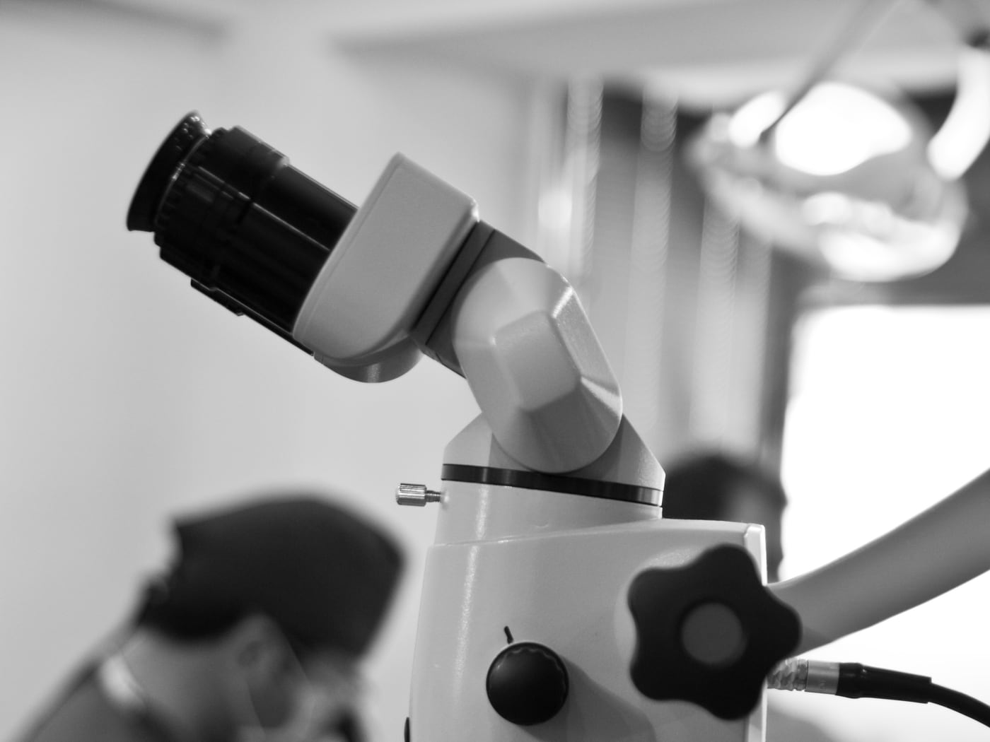 Surgical microscope in use during a procedure