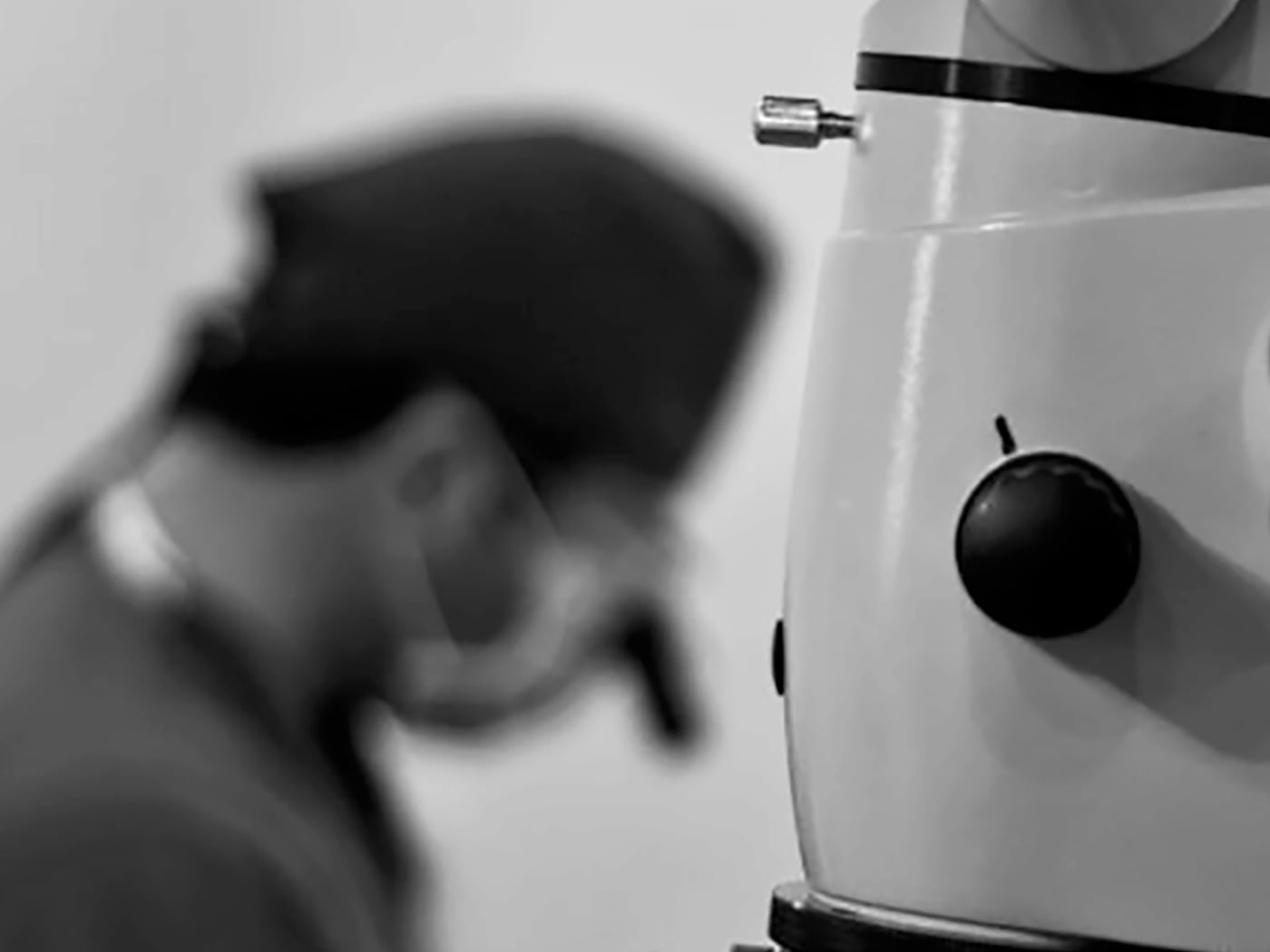 Surgeon operating under the microscope